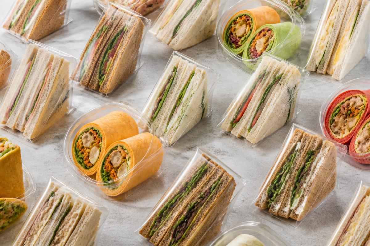 Individually packed sandwiches and colourful wraps ready for wholesale supply